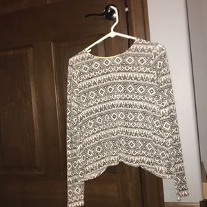 Long sleeve shirt with more of a sweater material.